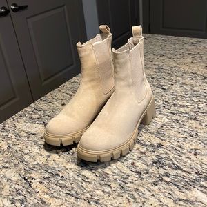 Hola Chelsea booties from Steve Madden feature a chunky sole. Easy slip on.